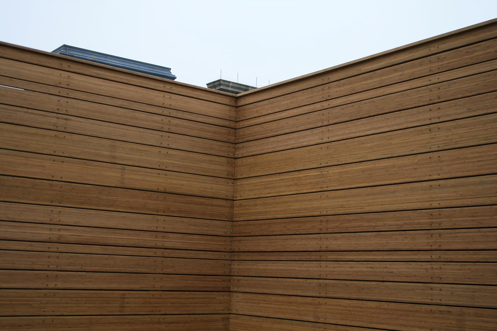 Copy of Bamdura-BAMBOO-decking-installed_oiled_fencing_tall_privacy_fence_divider_wall-11302023